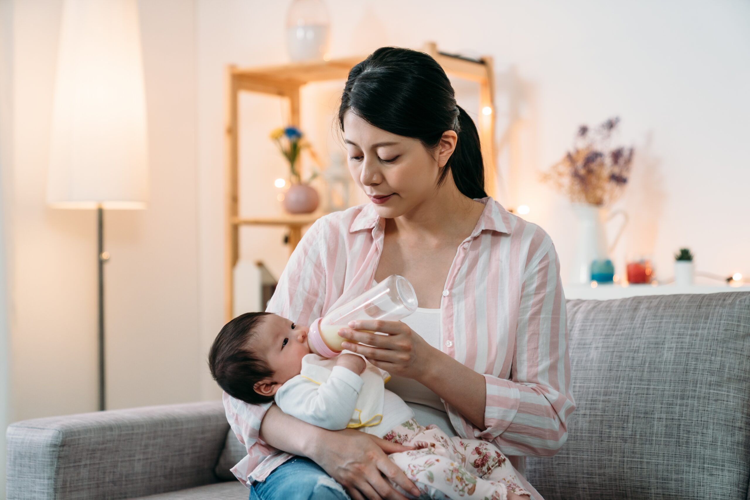 mother-bottle-feeding-baby