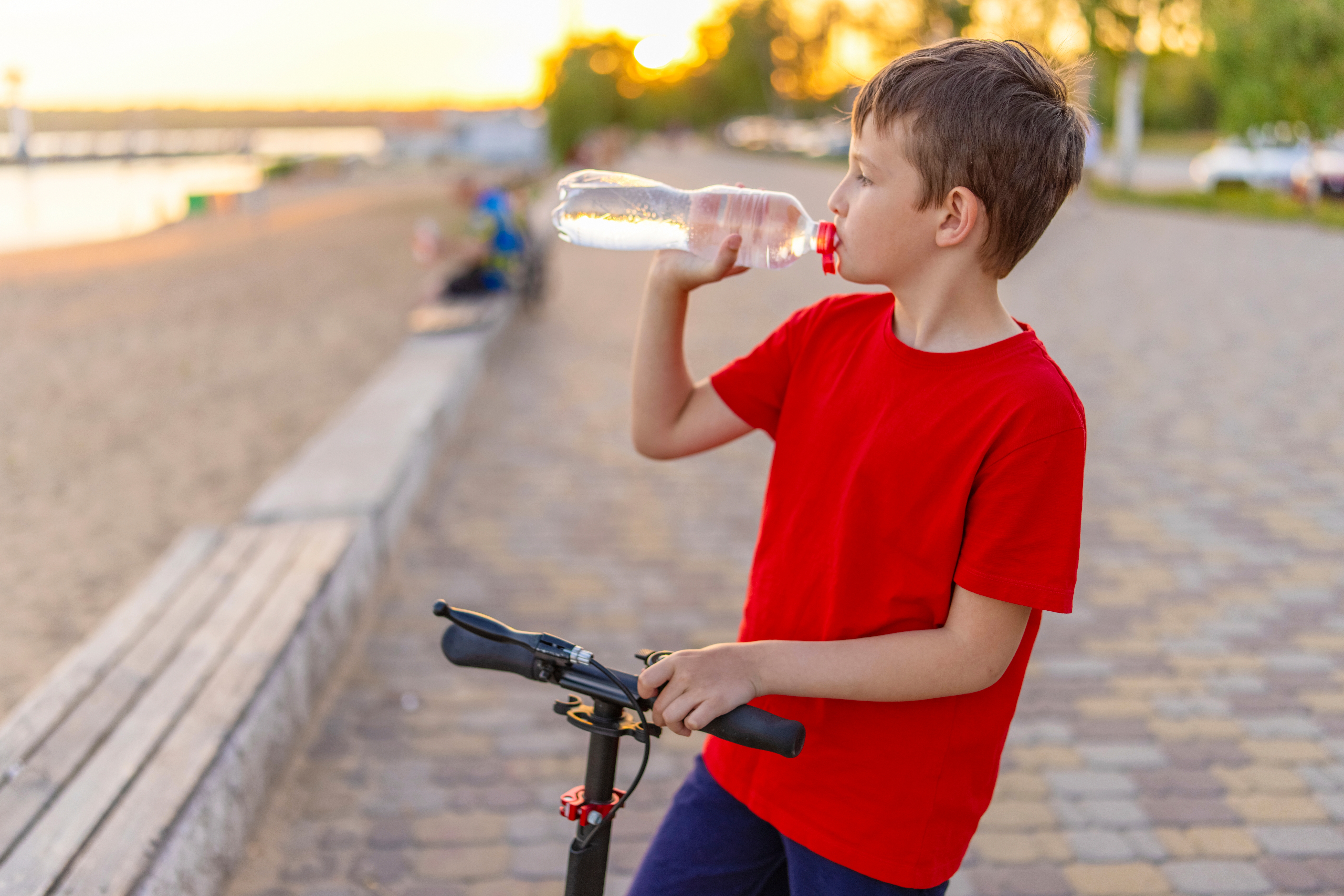 Child staying hydrated from physical activity