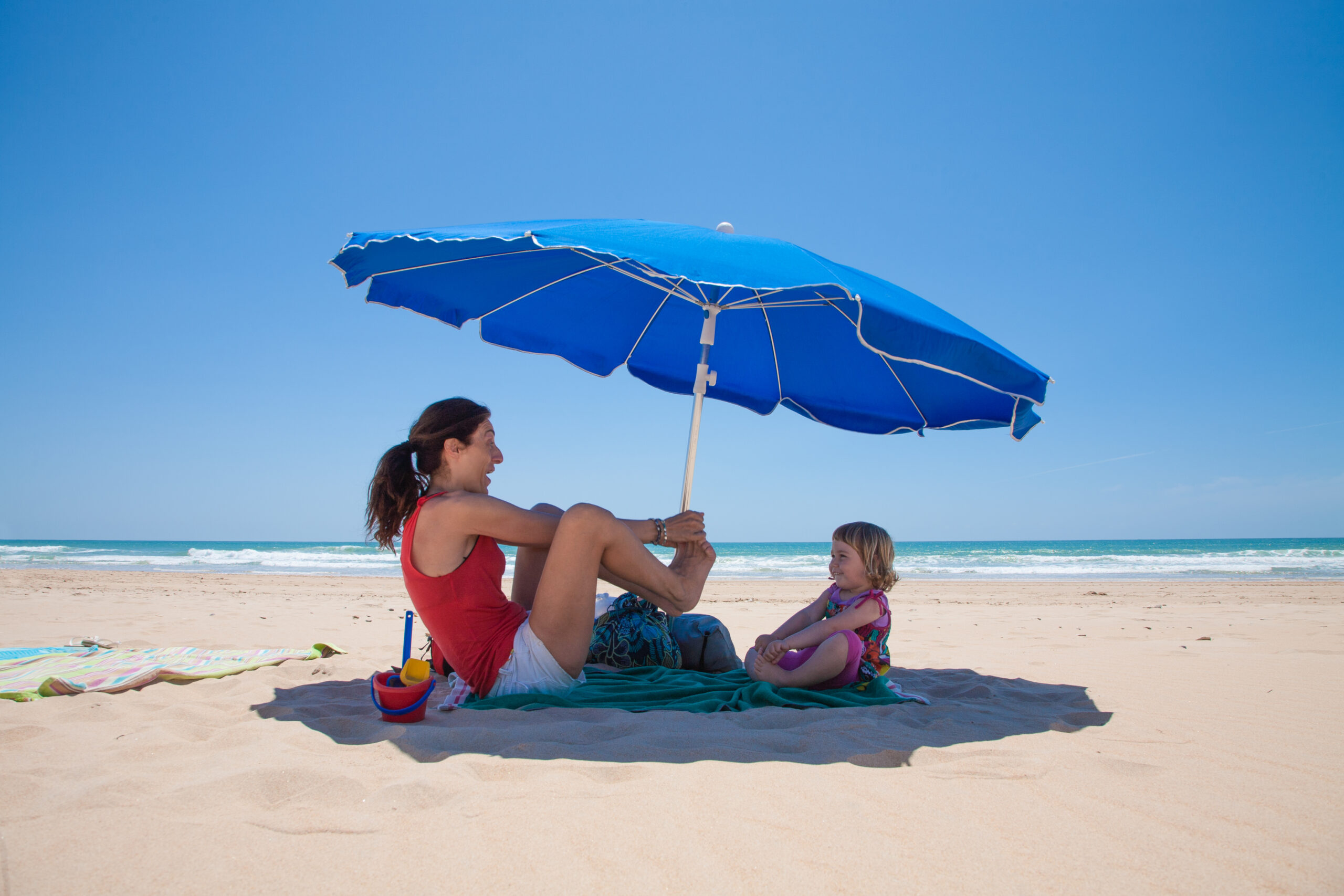 sun safety for kids - baby and mom under the shade